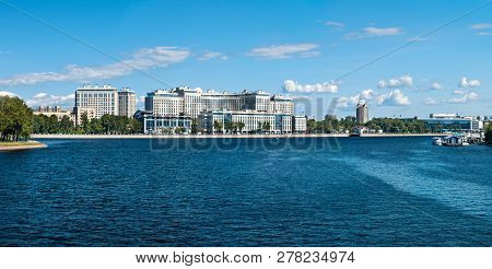 On The Banks Of The Bolshoy Nevka River On Ushakovskaya Embankment Are Modern High-rise Buildings In