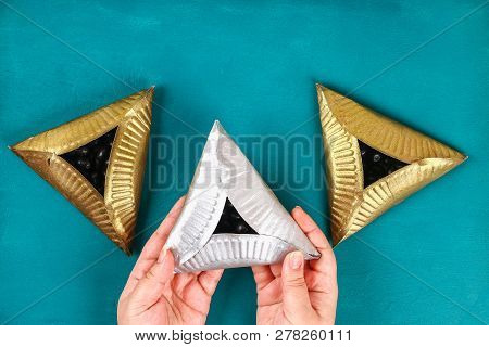 Purim. Diy Cookies Hamantaschen Of Cardboard Plates With Sweet Surprise Inside On Blue Background. G