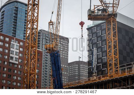 Montreal, Canada - November 6, 2018: Cranes And Building Device On A Construction Site Of A Skyscrap