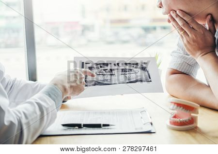 Dentist Learning How To Brush Teeth Concept