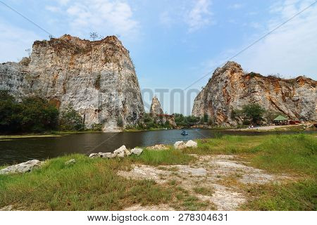 Rocky Mountain With Water Lake Of Khao Ngu Stone Park , Ratchaburi , Thailand.