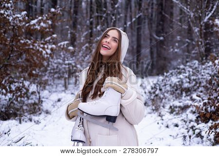 Outdoors. Joyful Beauty Young Woman Having Fun In Winter Park. Winter Woman Snow. Winter Woman Cloth