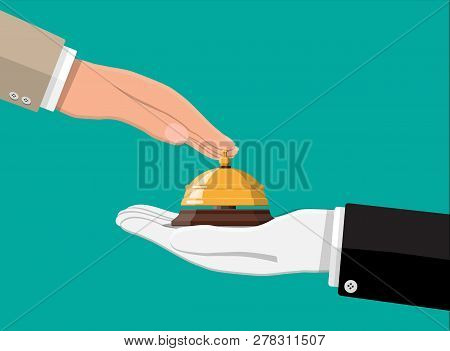 Golden Service Bell In Hand. Help, Alarm And Support Concept. Hotel, Hospital, Reception, Lobby And 
