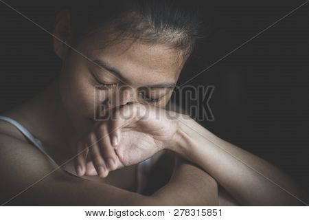 Sad Depressed Woman Suffering And From Family Life. Women Sitting In Dark Room And Crying, Young Bea