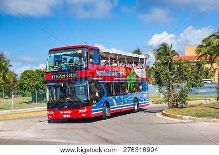 Varadero, Cuba - November, 2018: Varadero Red Beach Tour Bus In Cuba. Red And Green Panoramic Buses 