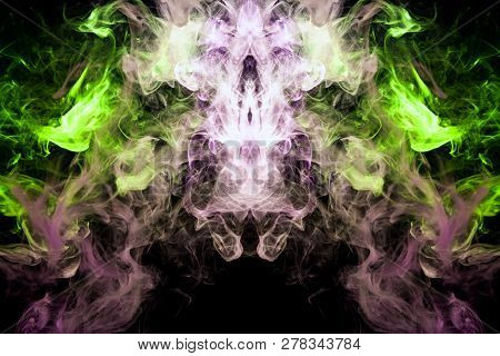Dense Multicolored Smoke Of   Green And Pink Colors In The Form Of A Skull, Monster, Dragon On A Bla