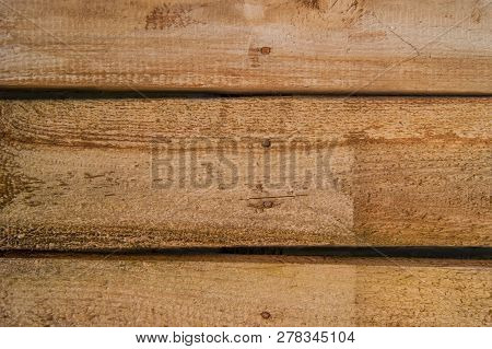 Texture Of A Rough Wooden Board On The Wall