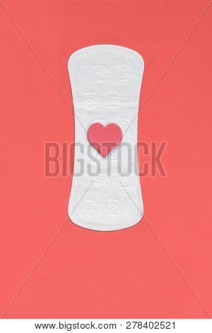 One Feminine Hygiene Pantyliners With A Heart On A Red Background