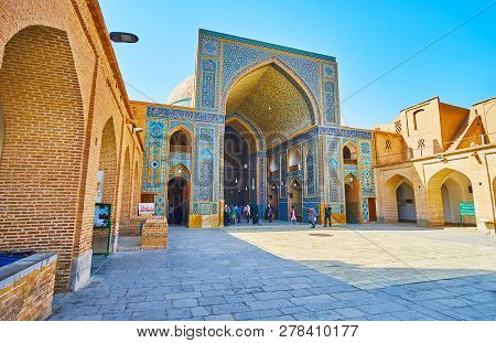 Yazd, Iran - October 18, 2017: The Ornate Islamic Patterns Of Azure And Dark Blue Tiles Cover The Br