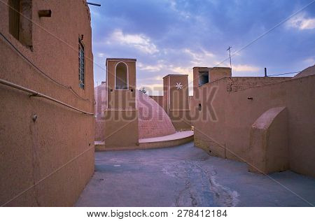 The Twilight Sky Above The Medieval Brick-adobe Yakhchal, Hidden Among The Narrow Curved Streets Of 