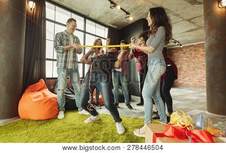 Friends Partying, Having Fun Playing Limbo Game
