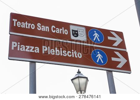 Teatro San Carlo And Piazza Plebiscito Street Sign In Naples, Italy