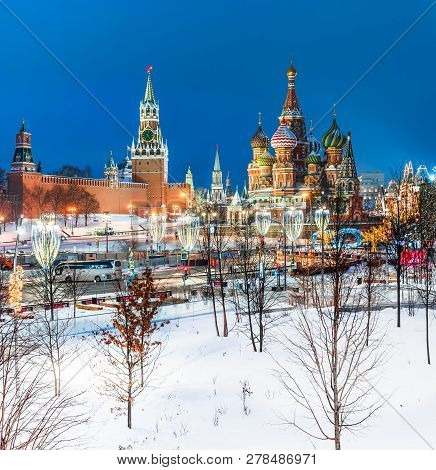 Moscow Kremlin On Red Square And Saint Basil S Cathedral At Snowy Winter Night View With Festive Ill