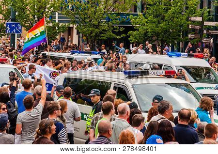 Vilnius, Lithuania - July 27, 2013: Police Cars Driving During The Pride Parade On Gedimino Street F