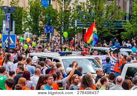 Vilnius, Lithuania - July 27, 2013: Pride Parade In Action. Crowd Of Watchers And Demonstrators With