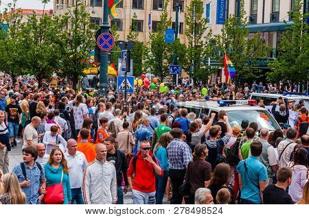 Vilnius, Lithuania - July 27, 2013: Pride Parade In Action. Crowd Of Watchers And Demonstrators With
