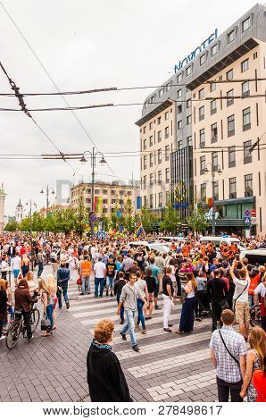 Vilnius, Lithuania - July 27, 2013: Pride Parade In Action. Crowd Of Watchers And Demonstrators With