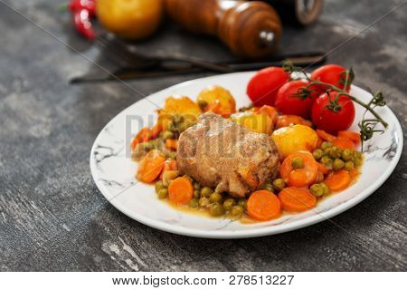 Beef meat stewed with potatoes-Traditional French cuisine Beef Bourguignon potatoes carrots in persillade