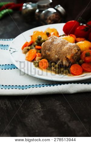 Beef meat stewed with potatoes-Traditional French cuisine Beef Bourguignon potatoes carrots in persillade
