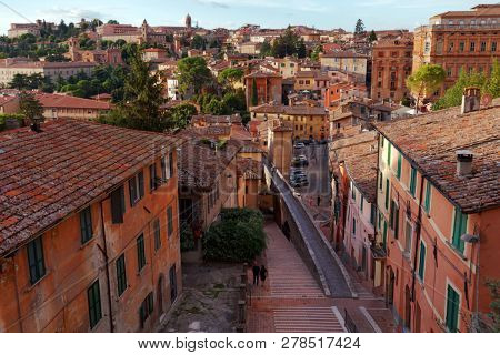 PERUGIA, ITALY - AUGUST 15, 2018: Cityscape of Perugia with the medieval aqueduct. The approximately three km long aqueduct from Monte Pacciano to Piazza Grande was built in 1254