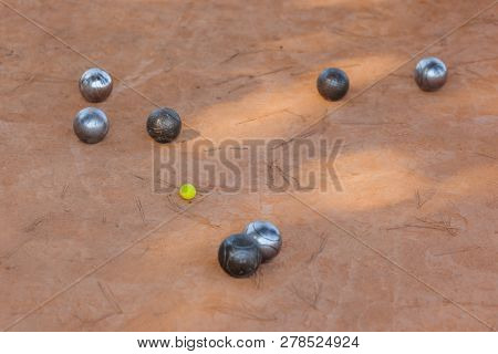 Petanque balls on the ground - sport background