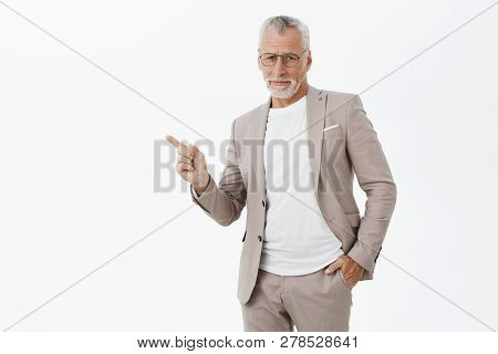 Portrait Of Arrogant And Stylish Good-looking Old Father In Stylish Formal Suit And Glasses Holding 