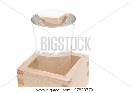 Japanese Wooden Box Masu With Sake Isolated On White Background