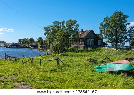 Island Solovki, Russia - June 26, 2018: View Of Houses In The Village Of Solovki On A Polar Summer D