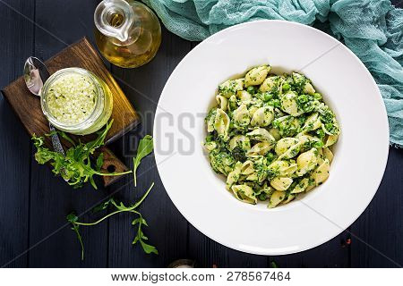Conchiglie Pasta With Spinach And Green Pea Pesto. Italian Cuisine. Vegan Food. Top View