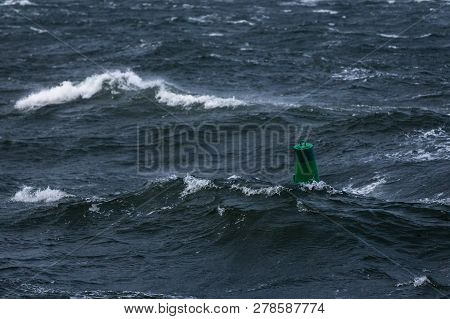 Green Buoy In Sea Water