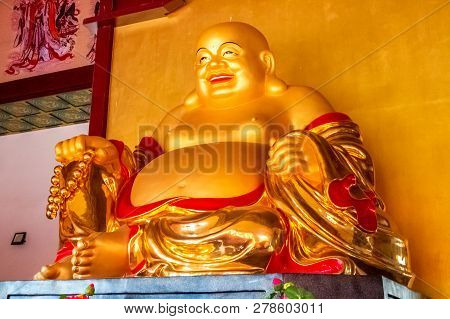 Statue Of Laughing Buddha In Hua Yan Or Huayan Temple In Tumen, China. Jilin Province, Korean Yanbia