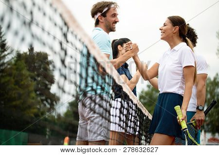 Fit Happy Poeple Playing Tennis Together. Sport Concept