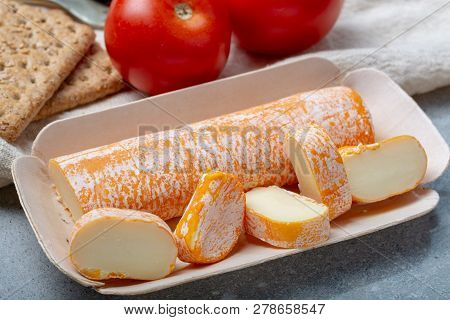 Fagotin Cheese With  Orange Coloured Rind Made From Cow Milk In Caves Of Maredsous Abbey, Belgium