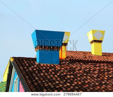 Many Colored Chimneys In Burano Island Near Venice In Italy