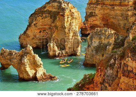Ponta Da Piedade, Algarve, Portugal - January 13, 2009 : Tourists Kayaking Through The Spectacular R