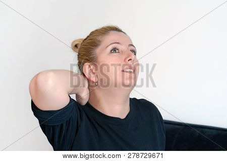 Tired Neck. Pain In The Neck Of Elderly Woman From Fatigue