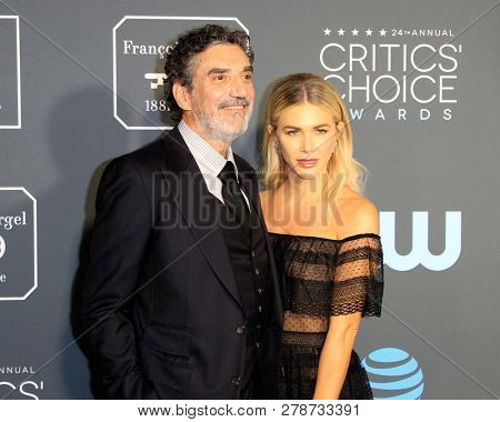 LOS ANGELES - JAN 13:   Chuck Lorre, Arielle Mandelson at the Critics Choice Awards  at the Barker Hanger on January 13, 2019 in Santa Monica, CA