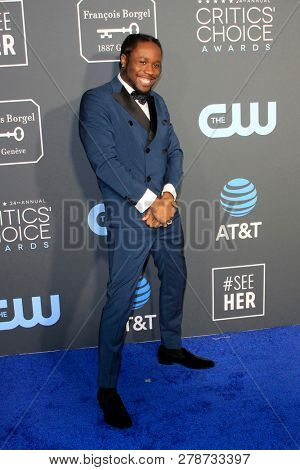 LOS ANGELES - JAN 13:  Shameik Moore at the Critics Choice Awards  at the Barker Hanger on January 13, 2019 in Santa Monica, CA