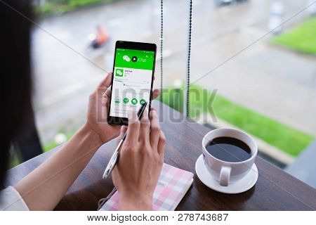 Chiang Mai, Thailand - August 18,2018: Woman Holding Huawei With Wechat  On The Screen.wechat Is A C