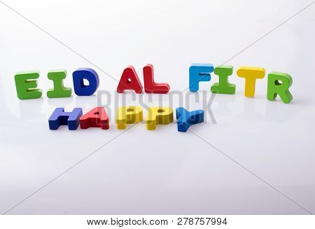 The Word Eid El Fitr  Written With Colorful Letter Blocks