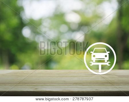 Service Fix Car With Wrench Tool Flat Icon On Wooden Table Over Blur Green Tree In Park, Business Re