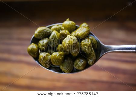 Edible Capers In Spoon Ready To Eat.