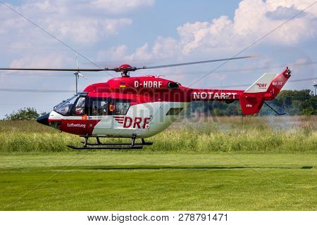 Ahlen Germany - Jun 5 2016: Drf Luftrettung (german Air Rescue) Bk-117 Helicopter Landing At Ahlen-n
