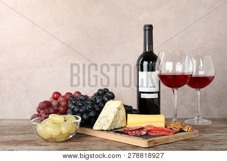 Composition With Wine And Snacks On Table. Space For Text