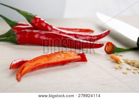 Red Cayenne Pepper. Deseed Hot Chili Peppers Before Chopping.