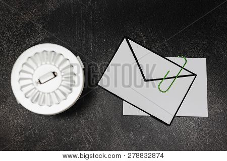Envelope With Clip Symbol Of Email And Attachments With Trash Can Next To It