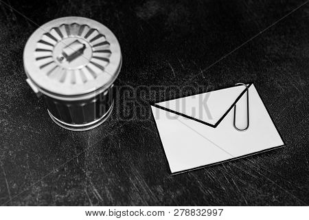 Envelope With Clip Symbol Of Email And Attachments With Trash Can Next To It