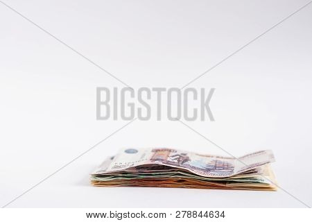 Stack Of Russian Money, Rubel Banknotes On White Background. Loan, Mortgage, Credit Concept, Copy Sp