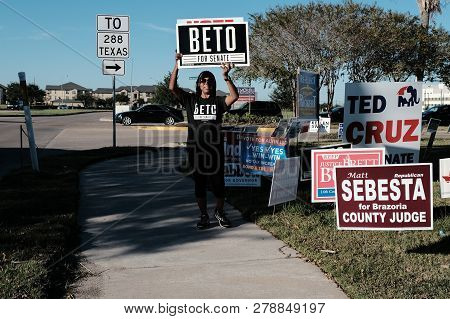 City Of Pearland, Texas - November 2, 2018: A Volunteer Holding Beto For Senate Sign Outside Voting