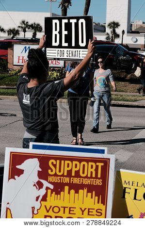 Houston, Texas - November 2, 2018: A Volunteer Holding Beto For Senate Sign Outside Voting Station I